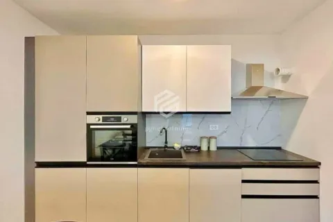 Small kitchen with built-in oven, sink and countertop. - image 7