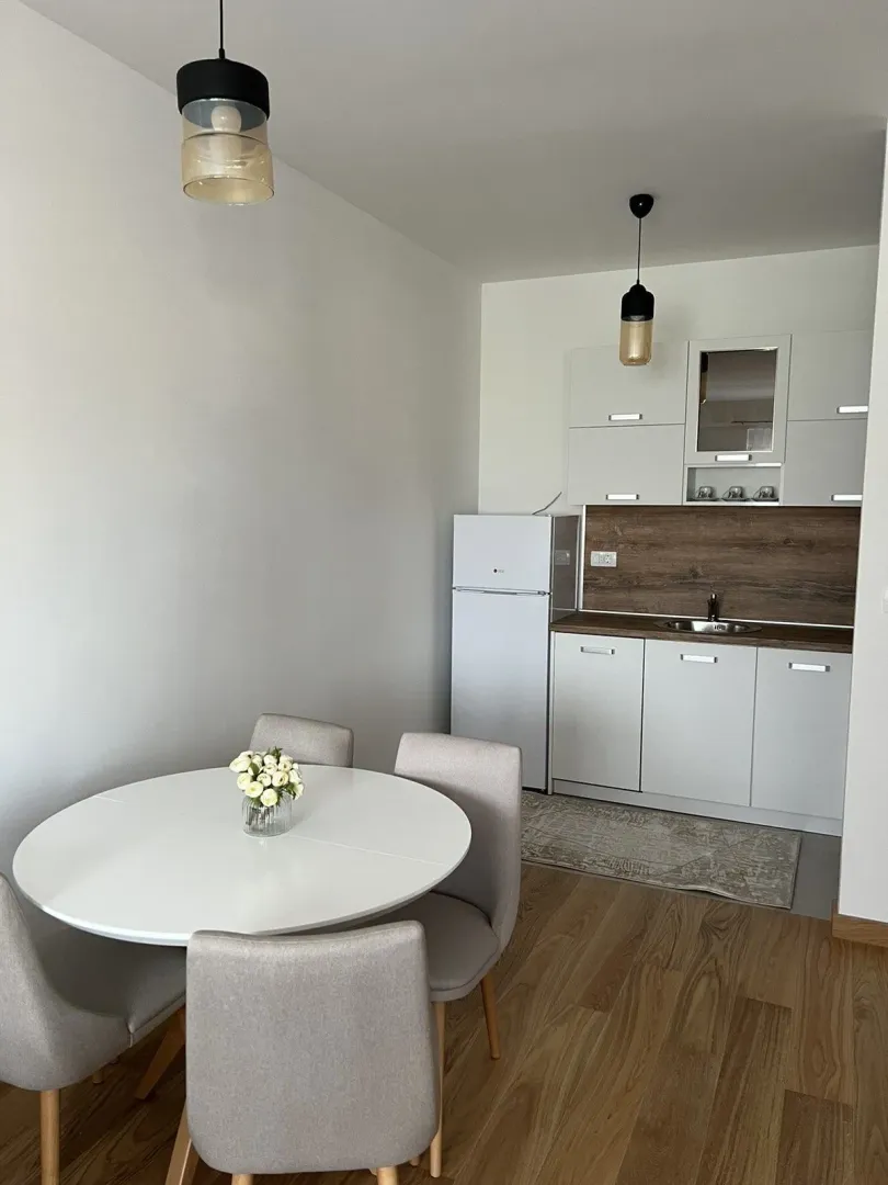 Bright kitchen with a dining table.