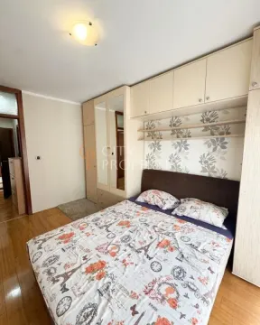 Furnished bedroom with a double bed and a fitted wardrobe. - image 8
