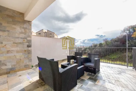 Spacious covered terrace with seating set and surrounding view. - image 6