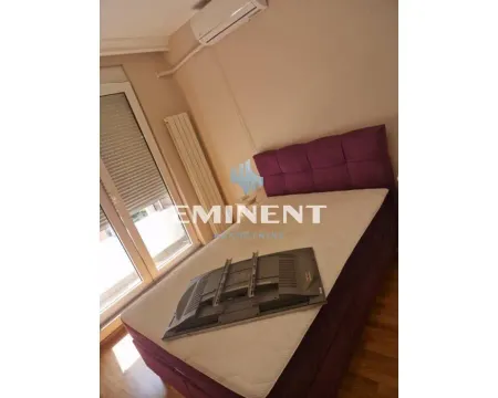 Furnished bedroom with a double bed and air conditioning. - image 12