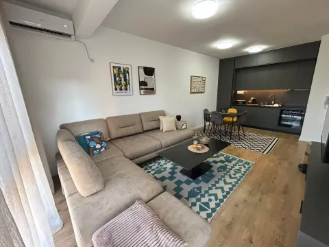 Modern living room connected to the dining area and kitchen. - image 13