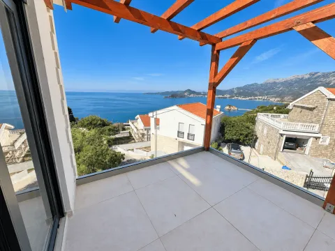 Modern terrace with a wooden pergola and sea view. - image 5