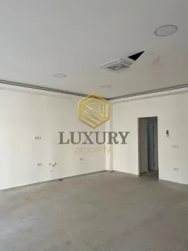 Empty room in a new construction with white walls and tiled flooring. - image 5