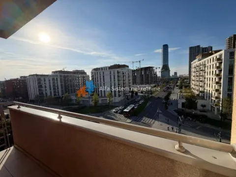 View of city streets and buildings from the terrace. - image 12