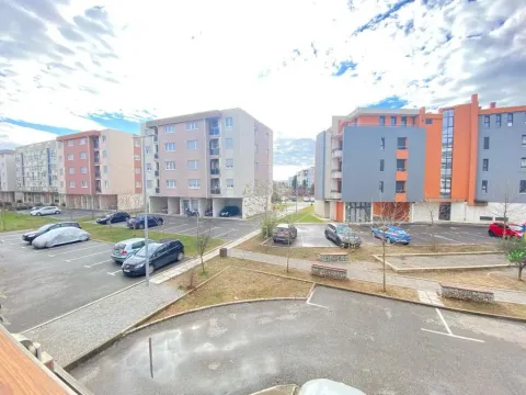 View from the terrace of residential buildings and parking in front of the complex. - image 8