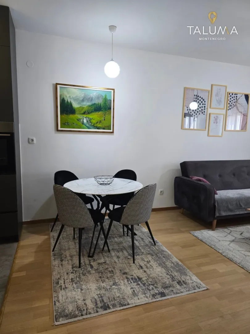 Living room with a dining table and chairs.