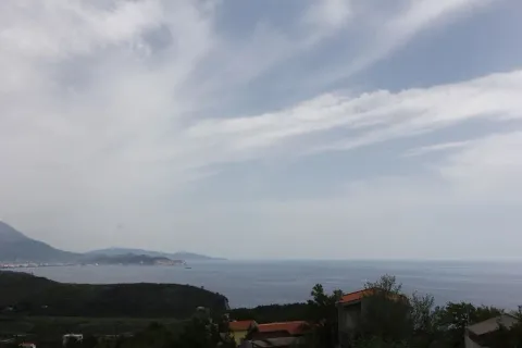 Panoramic view of the sea and hills in the distance. - image 11