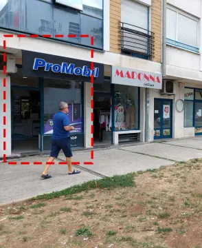 Exterior view of a commercial space on the ground floor of a building. - image 2