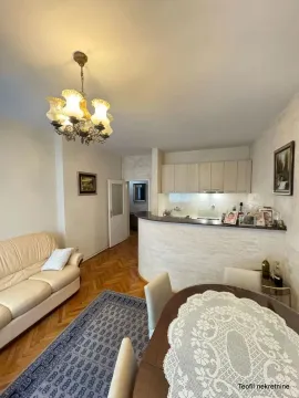 Living room connected with the dining area and kitchen. - image 2
