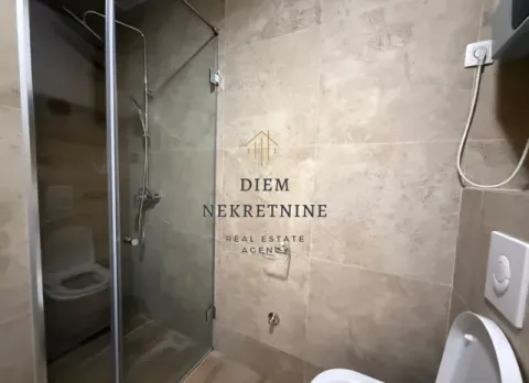 Modernly equipped bathroom with a walk-in shower and sanitary fixtures. - image 12