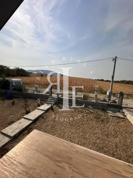 View of the yard and surrounding landscape from the terrace.