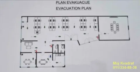 Evacuation plan of the office space showing the layout of rooms and exits. - image 20