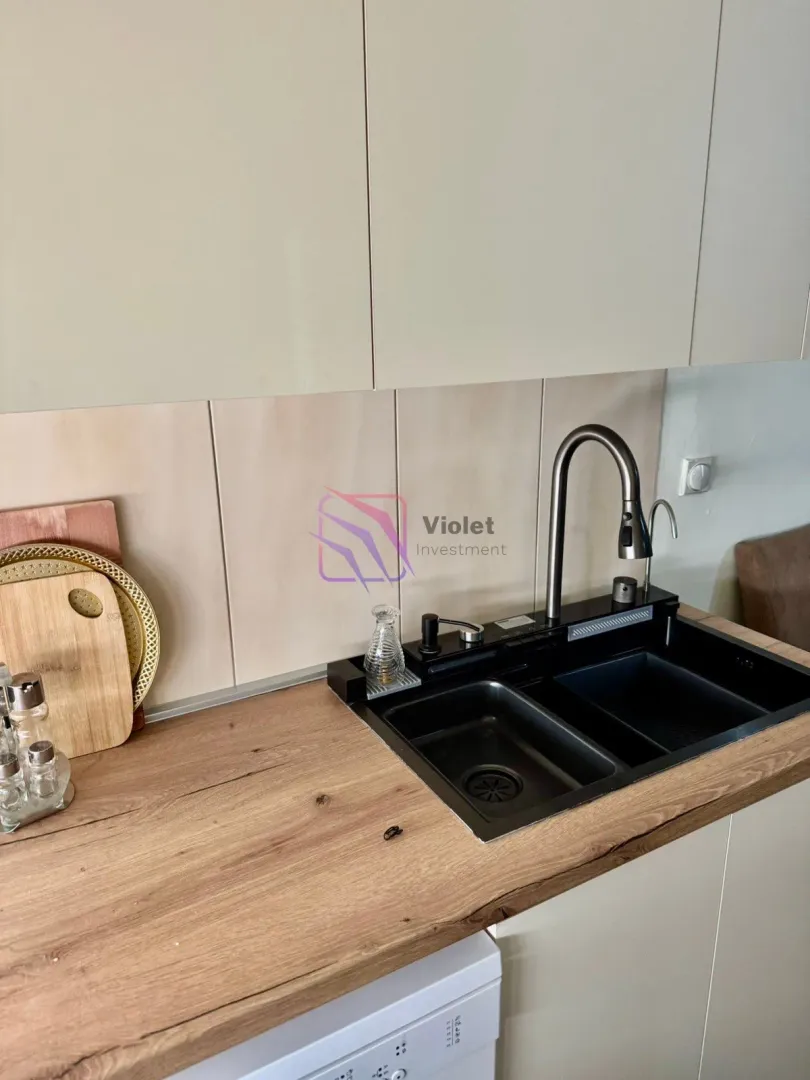 View of the kitchen sink and countertop.