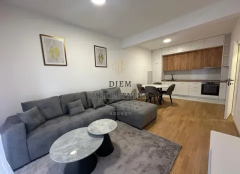 Modern living room connected to the dining area and kitchen. - image 4