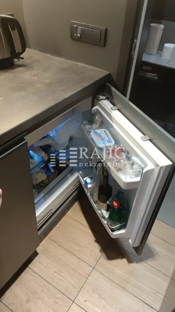 View of the built-in refrigerator in the kitchen.