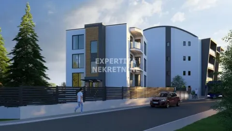 Exterior view of a modern residential building with a fence and street. - image 5
