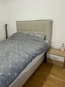 Bedroom with a double bed and a nightstand. - image 6