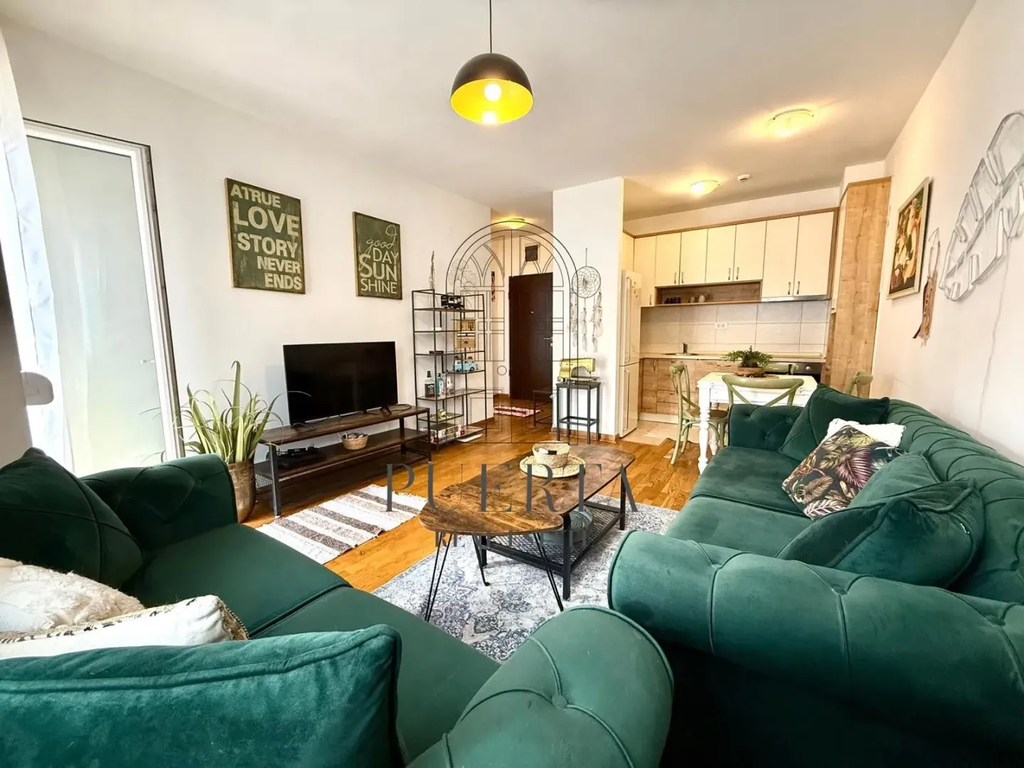 Living room connected with the dining area and kitchen.