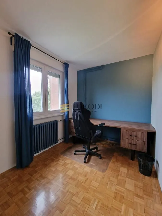 Study room with a desk and an office chair.