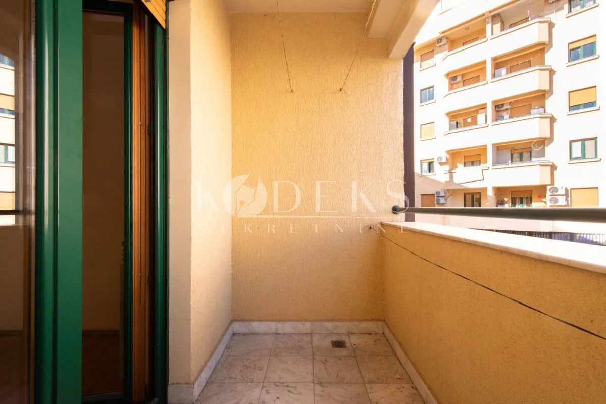 Unfurnished balcony with a view of neighboring buildings.