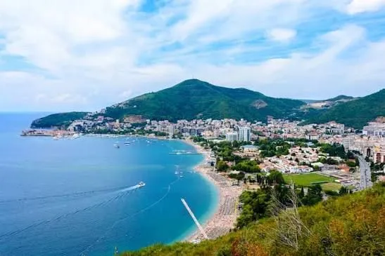 Elevated view of the town, beach, and coastline.