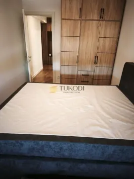 Bedroom with a double bed and a fitted wardrobe. - image 8