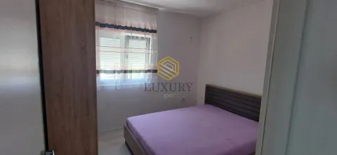 Smaller bedroom with a double bed and a window. - image 10