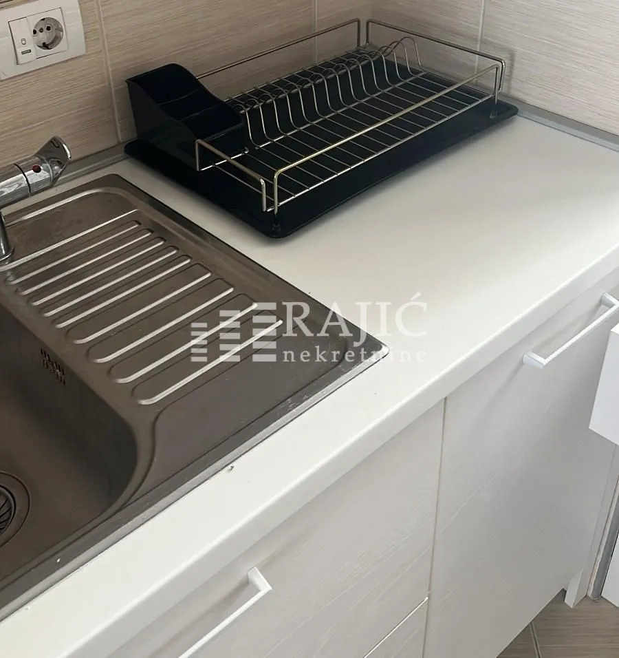 View of the kitchen sink and countertop.