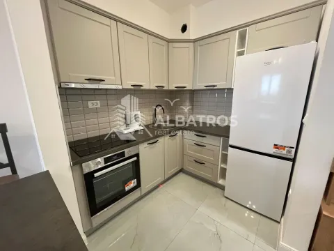 Kitchen equipped with kitchen units and home appliances. - image 7