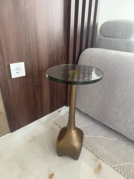 Interior detail featuring a side table and sofa in the living room. - image 8