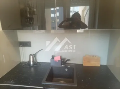 Part of the kitchen with a sink and countertop. - image 5