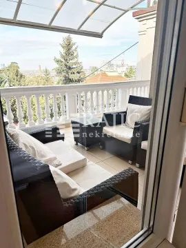 Furnished terrace with seating furniture and a view. - image 13