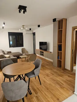 Spacious living room with dining area and modern furniture. - image 6