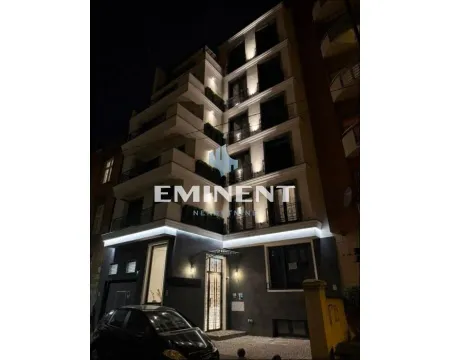 Night view of the building exterior with lighting. - image 2