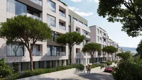 Pogled na spoljašnjost moderne stambene zgrade sa uređenim zelenilom i drvećem. - image 9