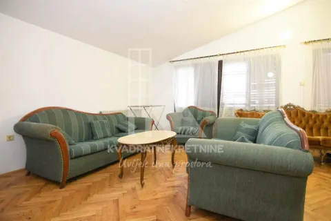 Spacious living room with a seating set and parquet flooring. - image 2