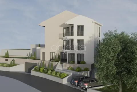 Spoljašnji izgled moderne stambene zgrade sa uređenim dvorištem i parkingom. - image 3