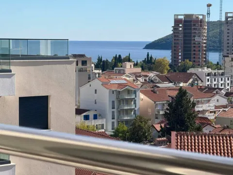View of the sea and surrounding buildings from the terrace. - image 3