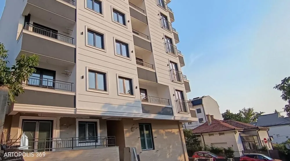 View of the facade and balconies of the residential building.