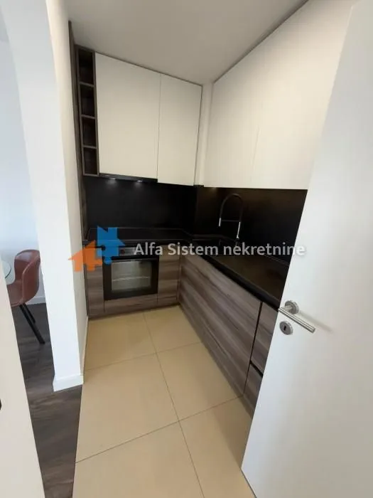 Modern kitchen with built-in units and appliances.