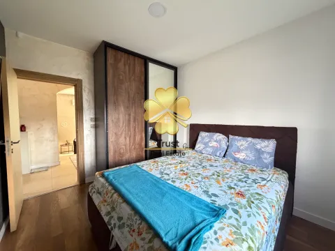 Furnished bedroom with a double bed and wardrobe. - image 11