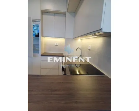 Modern kitchen with built-in units and lighting. - image 4