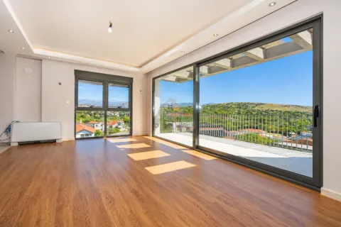 Empty living room with large glass surfaces and access to the terrace. - image 21