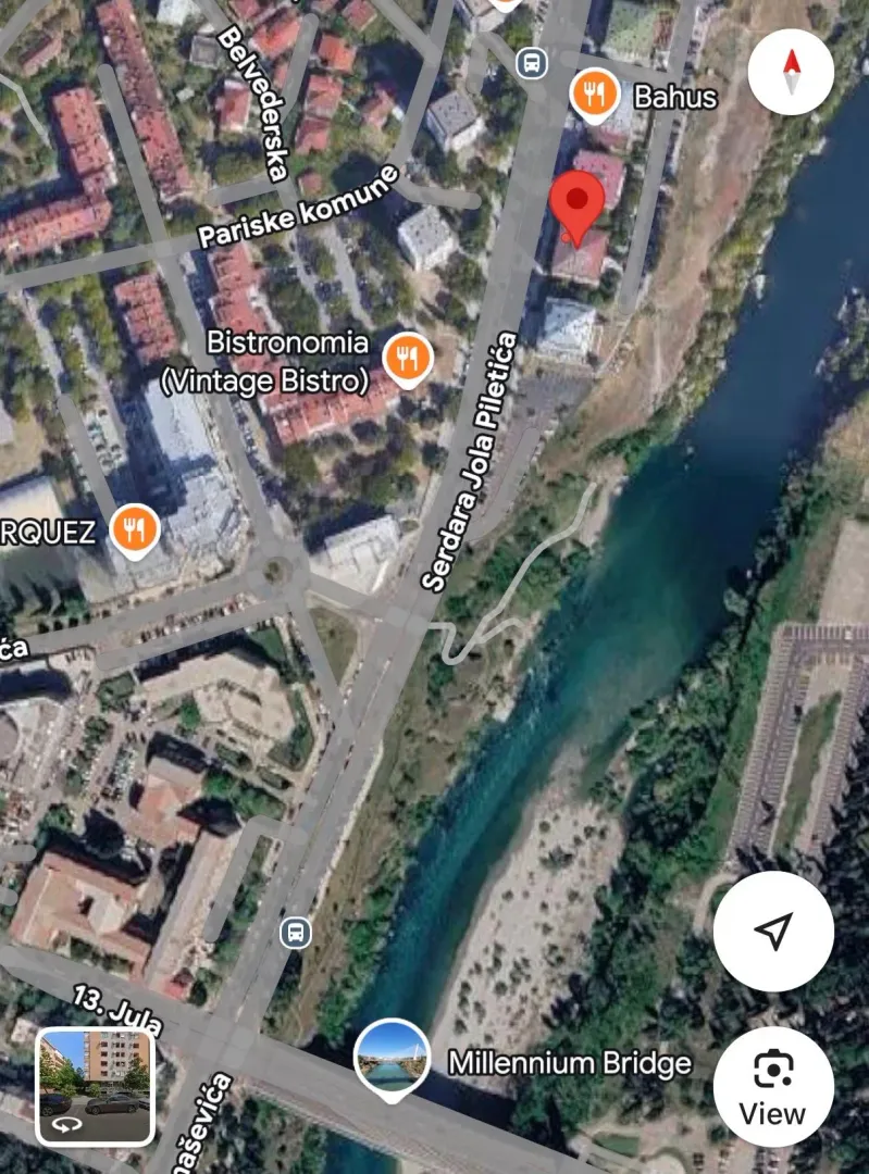 Satellite image of the property location with a marked spot on the map.
