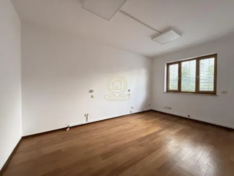 Empty bright room with wooden flooring and a window. - image 10
