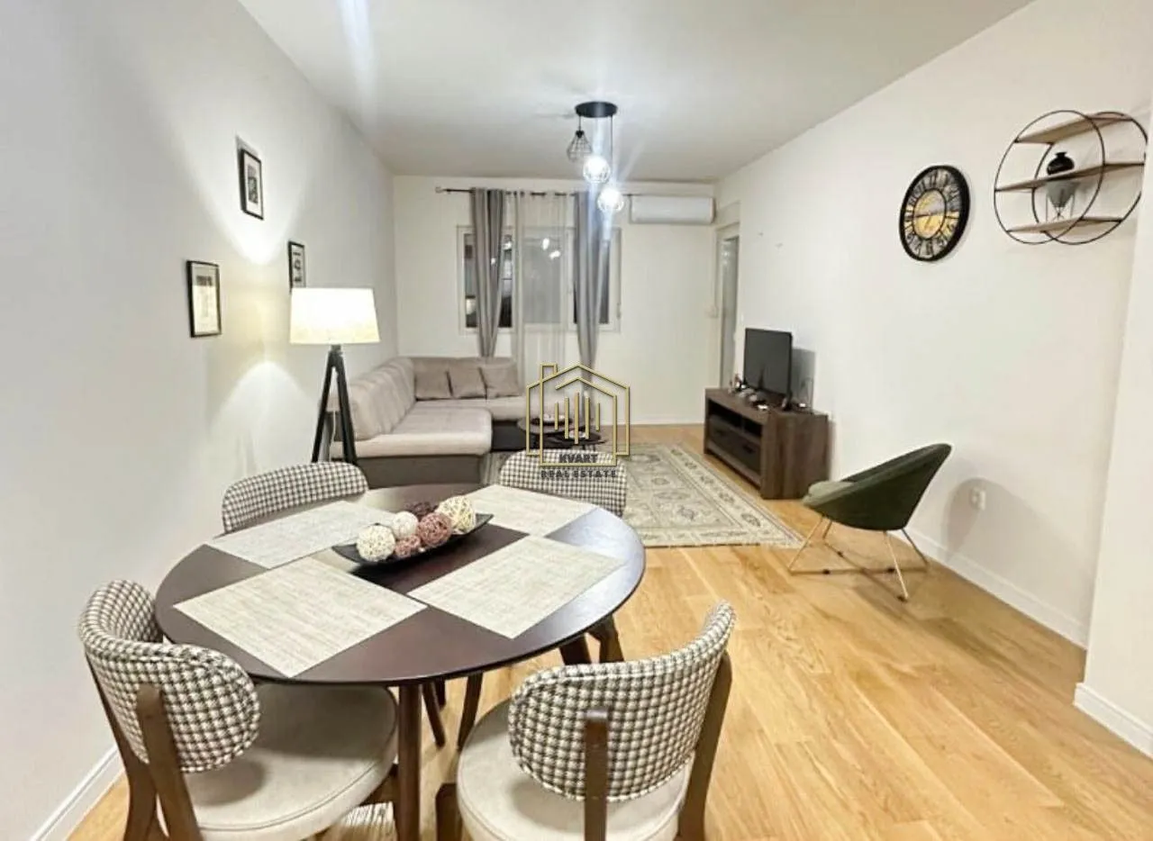 Living room with a dining area and seating set.