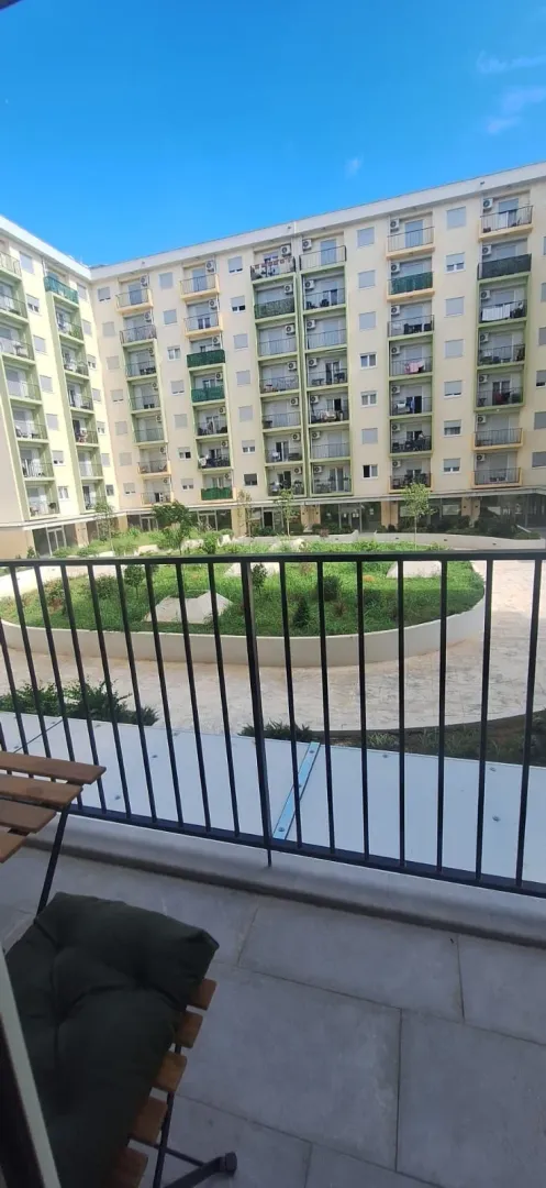 View from the terrace towards the courtyard and building.