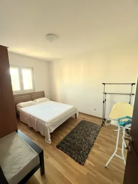 Furnished bedroom with a double bed. - image 2
