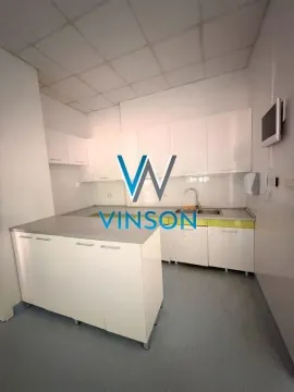 White kitchen with cabinets and a sink. - image 8